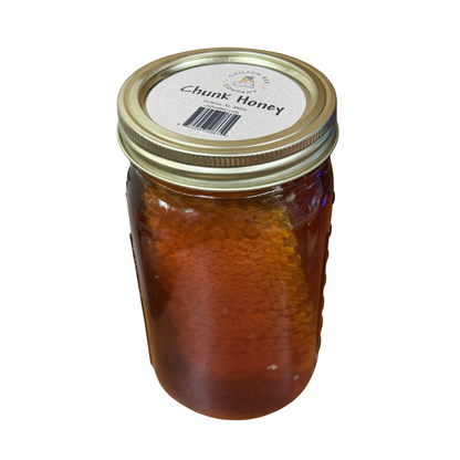 Chunk Honey jar from Chilton Bee Company showing label on lid with barcode, angled view on white background