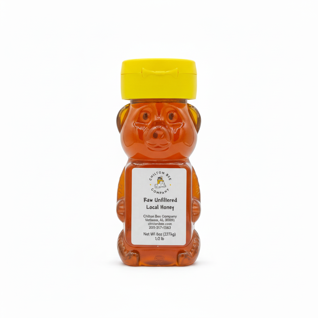 Raw wildflower honey bear bottle 1/2 pound showing golden color